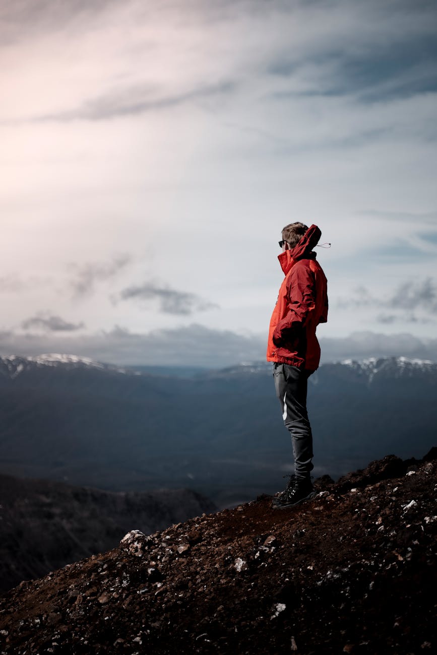 man standing on a mountain